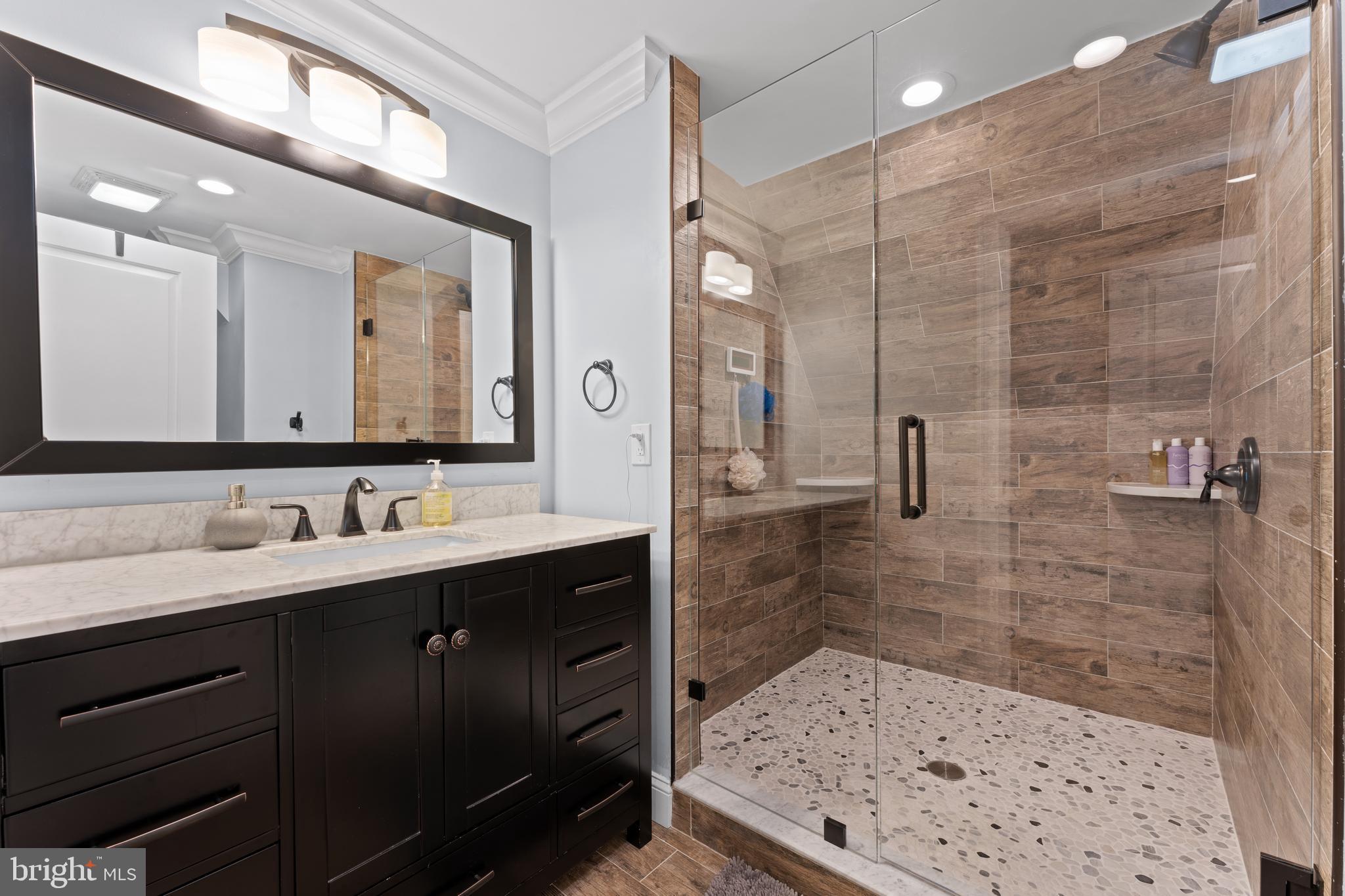 334 Fairhill Road Wynnewood, PA 19096 - Photo 29 of 45 a bathroom with a sink a toilet and shower