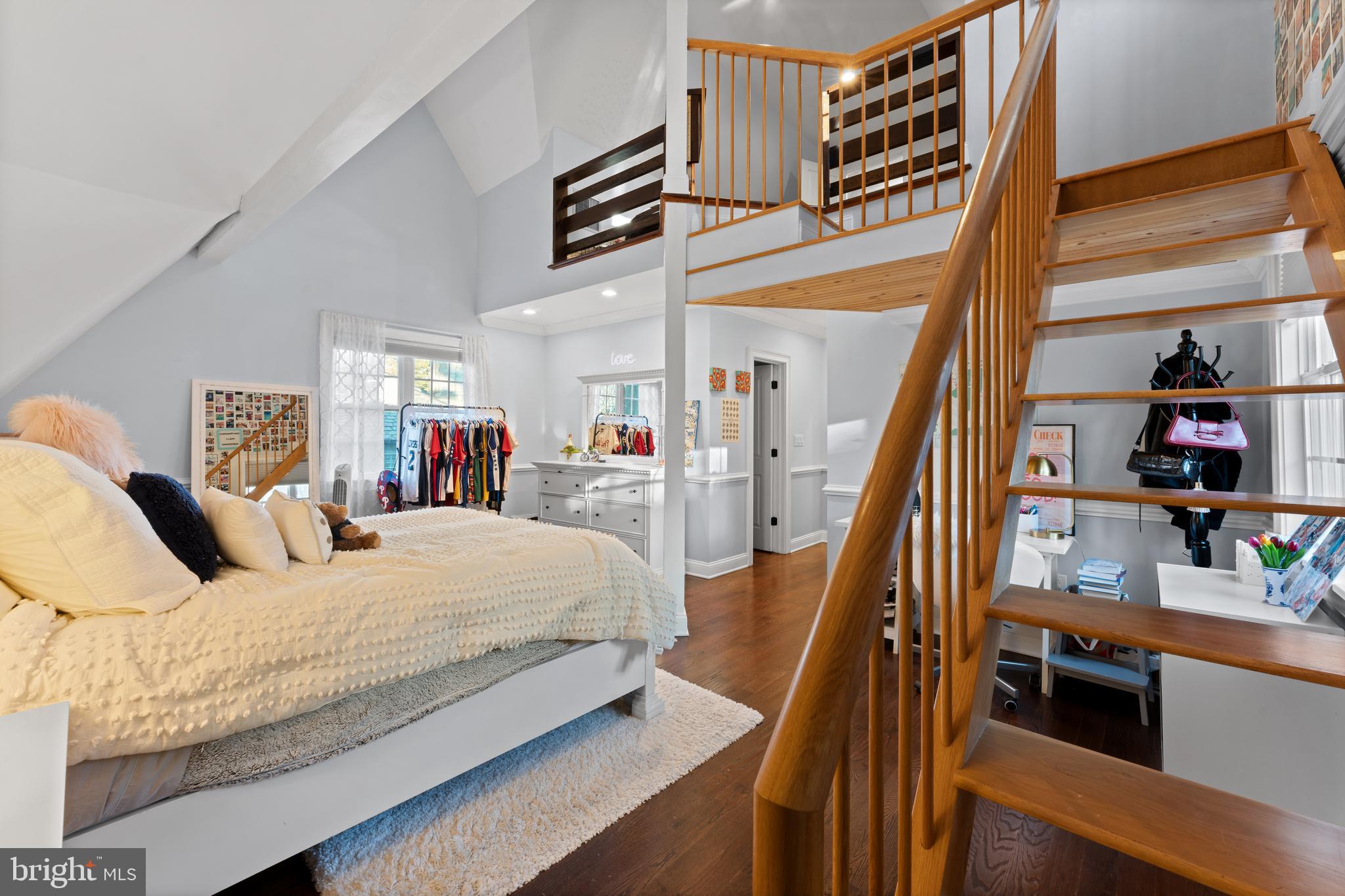 334 Fairhill Road Wynnewood, PA 19096 - Photo 31 of 45 a bedroom with a bed and a large mirror on the dresser