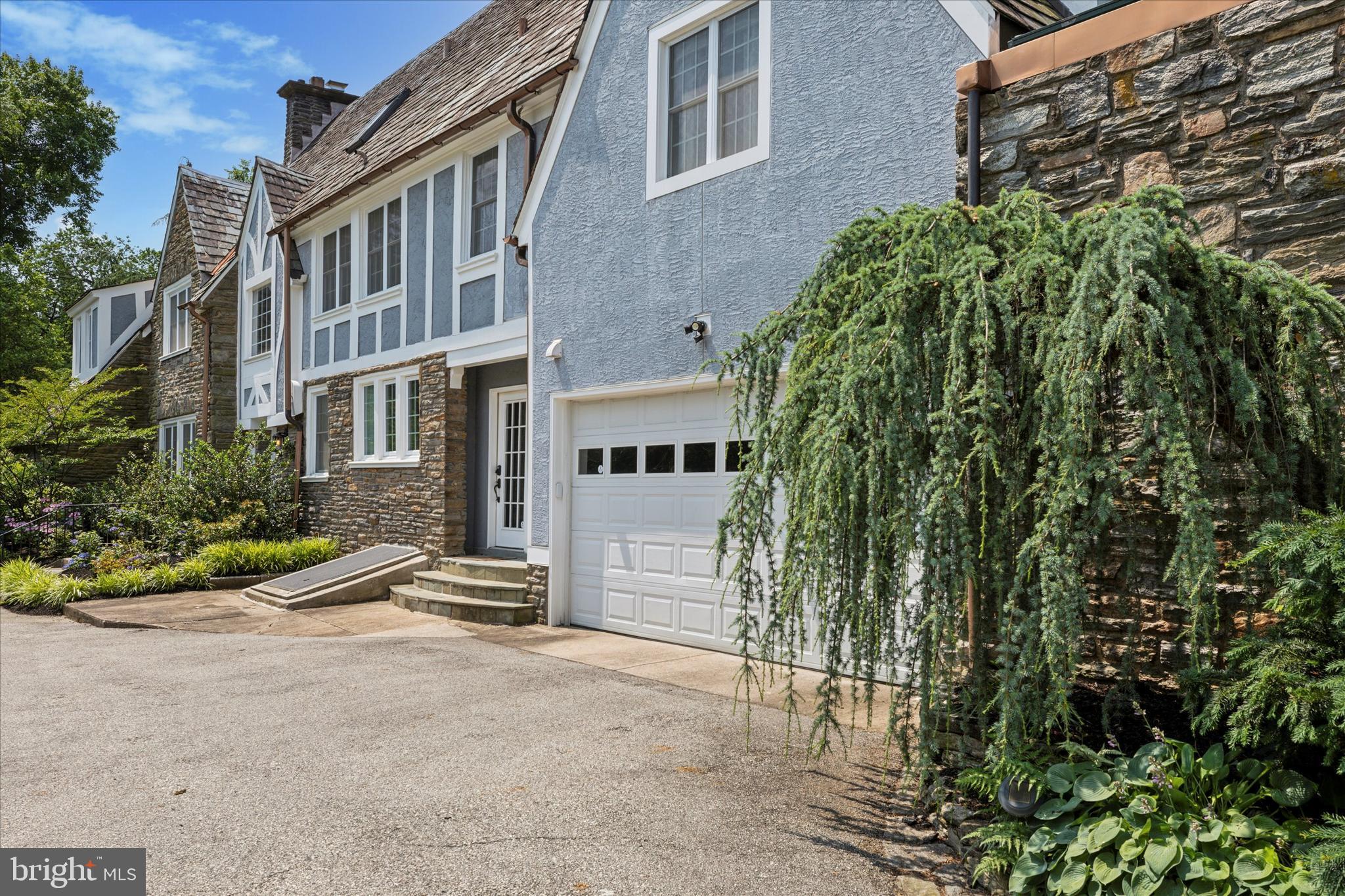 334 Fairhill Road Wynnewood, PA 19096 - Photo 38 of 45 a front view of a house with a yard