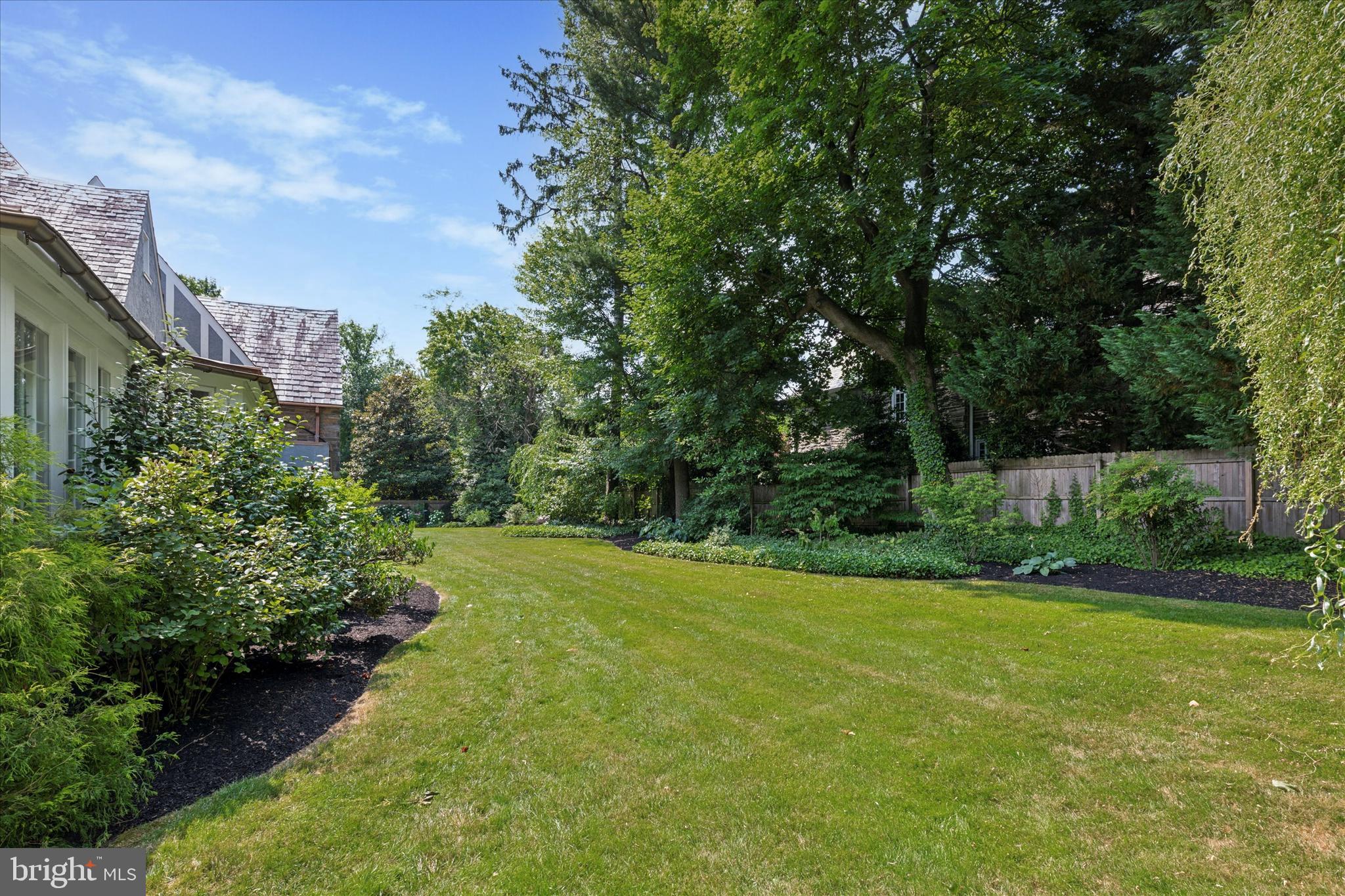 334 Fairhill Road Wynnewood, PA 19096 - Photo 42 of 45 a view of a backyard with large trees