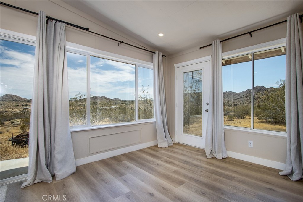 9073 Tortuga Trail Joshua Tree, CA 92252 - Photo 24 of 39 a view of an empty room and window