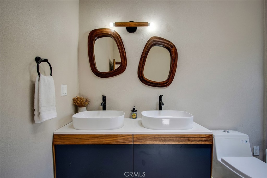 9073 Tortuga Trail Joshua Tree, CA 92252 - Photo 32 of 39 a bathroom with a sink and a mirror