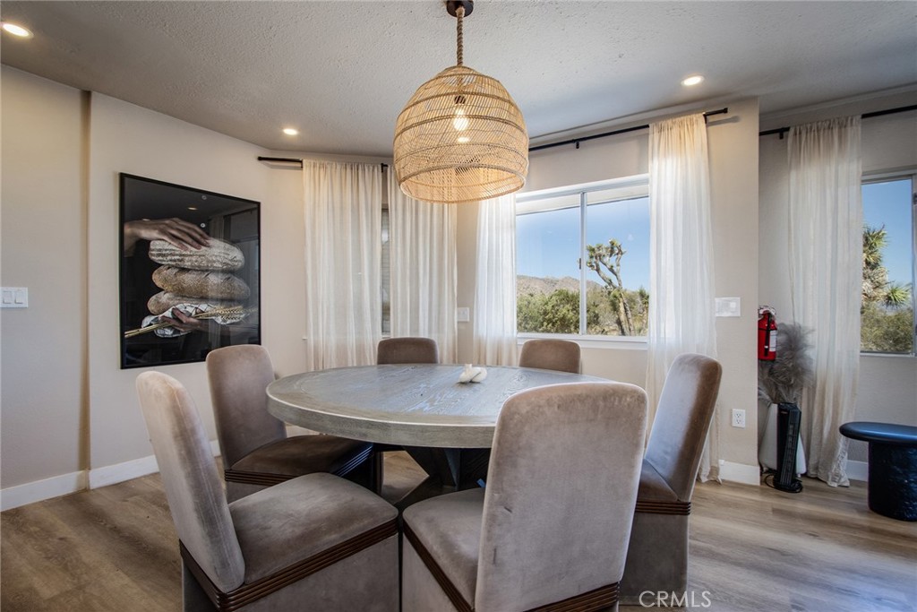 9073 Tortuga Trail Joshua Tree, CA 92252 - Photo 8 of 39 a dining room with furniture and window