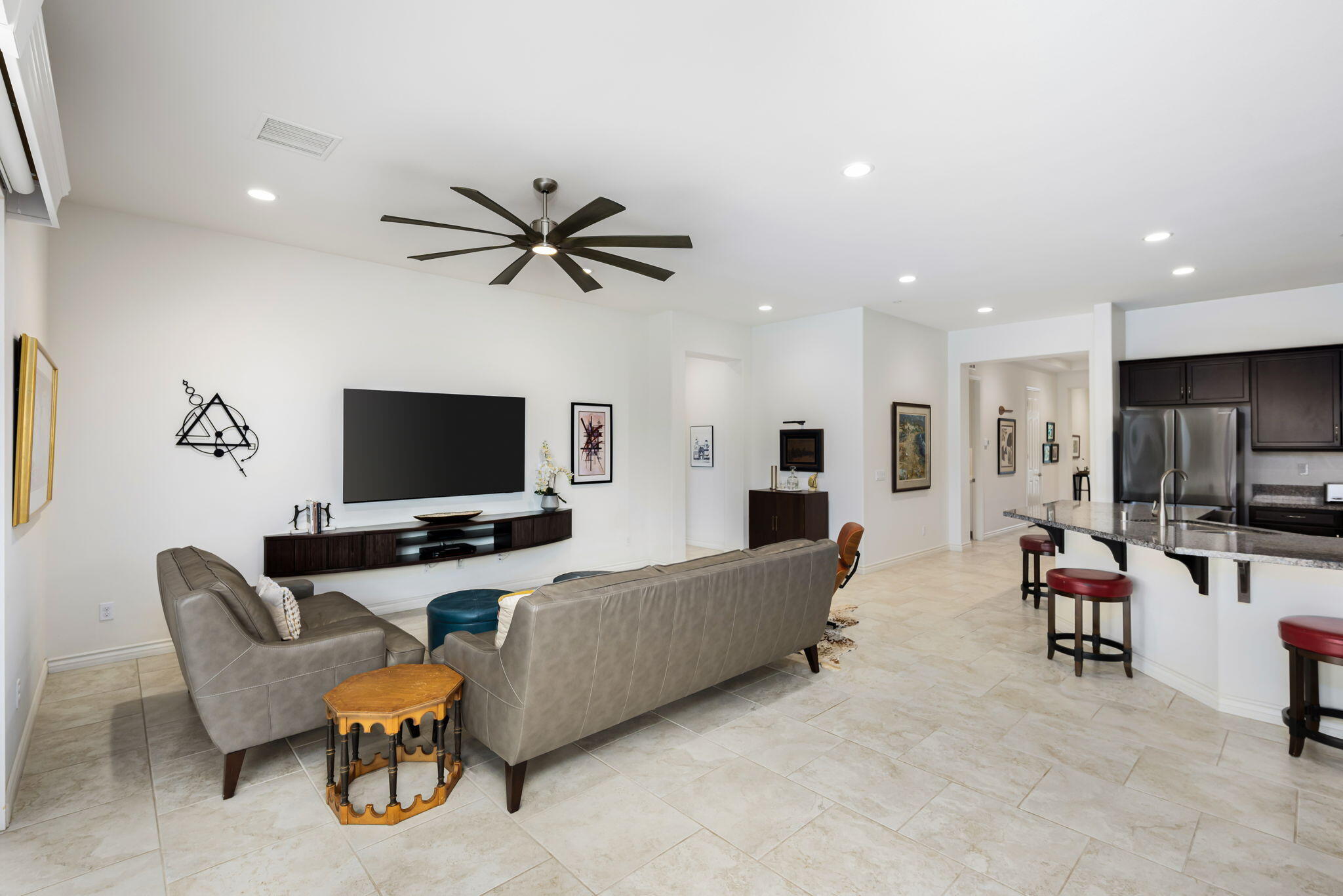 85568 Brovello Drive Indio, CA 92203 - Photo 18 of 50 a living room with furniture and a flat screen tv