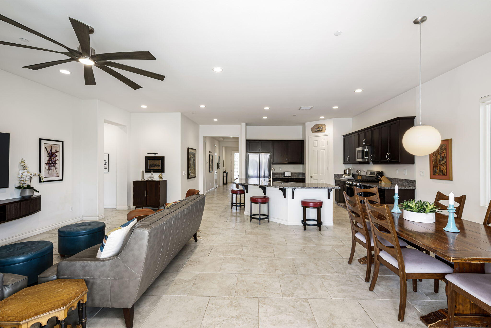 85568 Brovello Drive Indio, CA 92203 - Photo 19 of 50 a living room with furniture and a flat screen tv