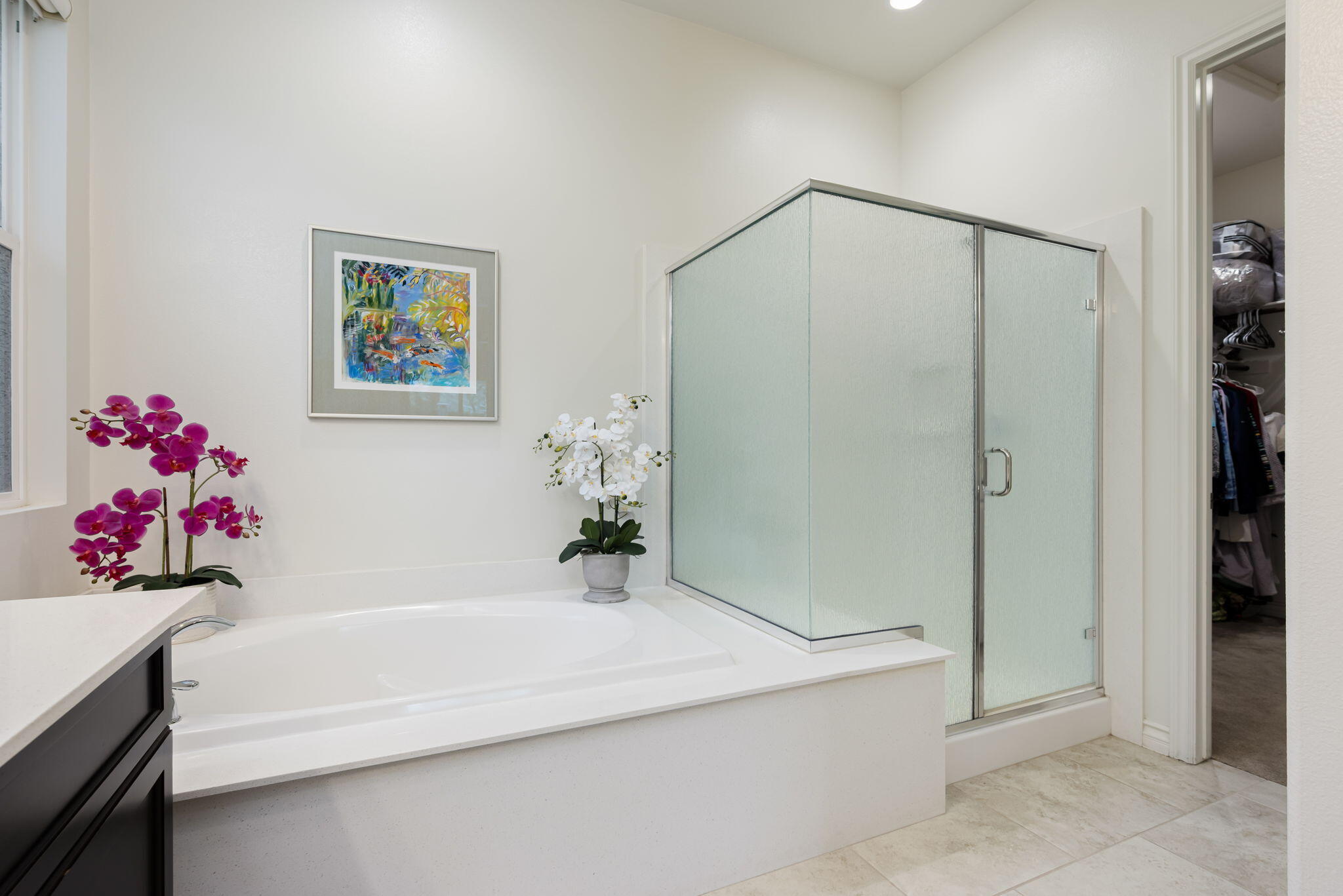 85568 Brovello Drive Indio, CA 92203 - Photo 25 of 50 a bathroom with a bathtub sink vanity and shower