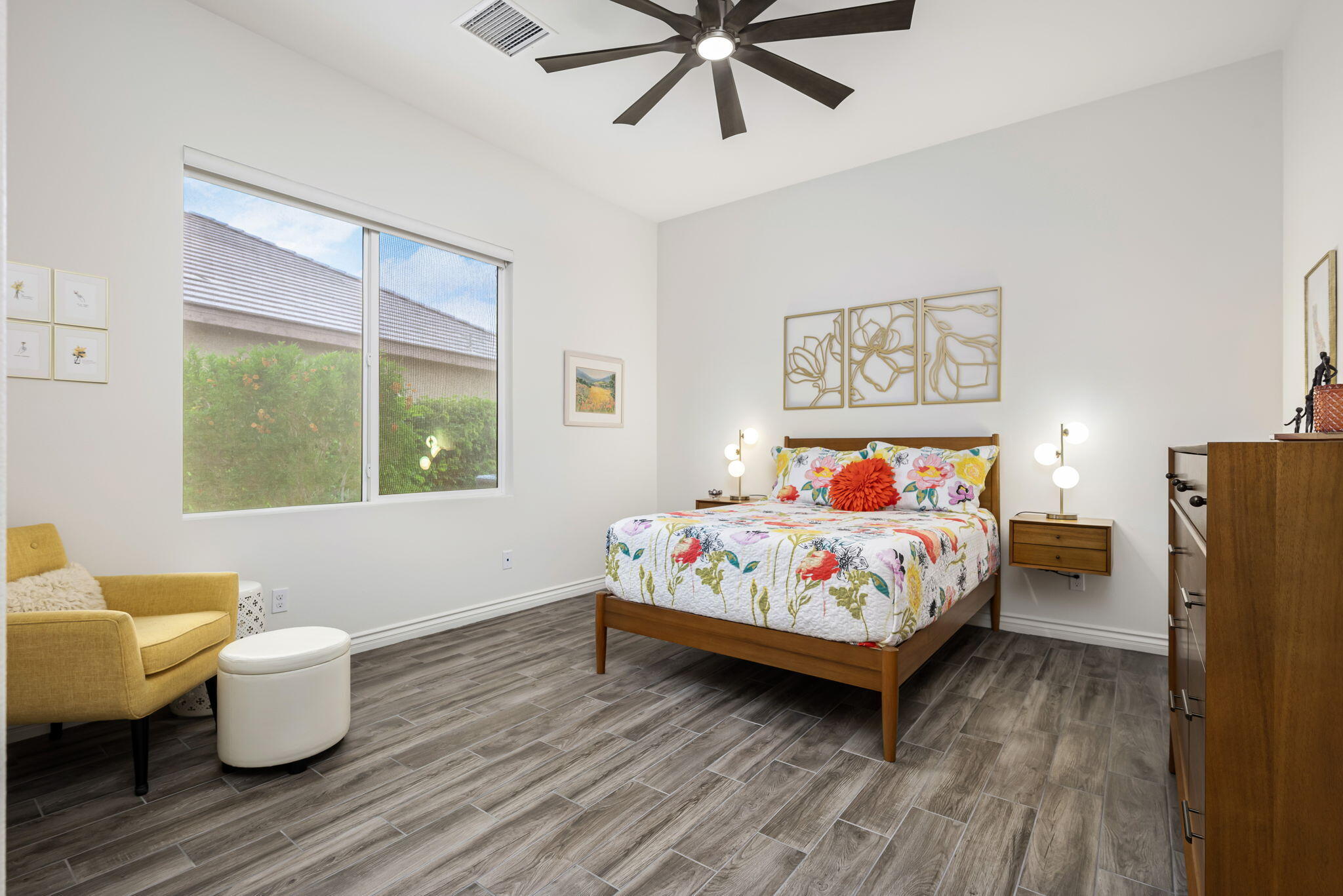 85568 Brovello Drive Indio, CA 92203 - Photo 26 of 50 a bedroom with a bed and window