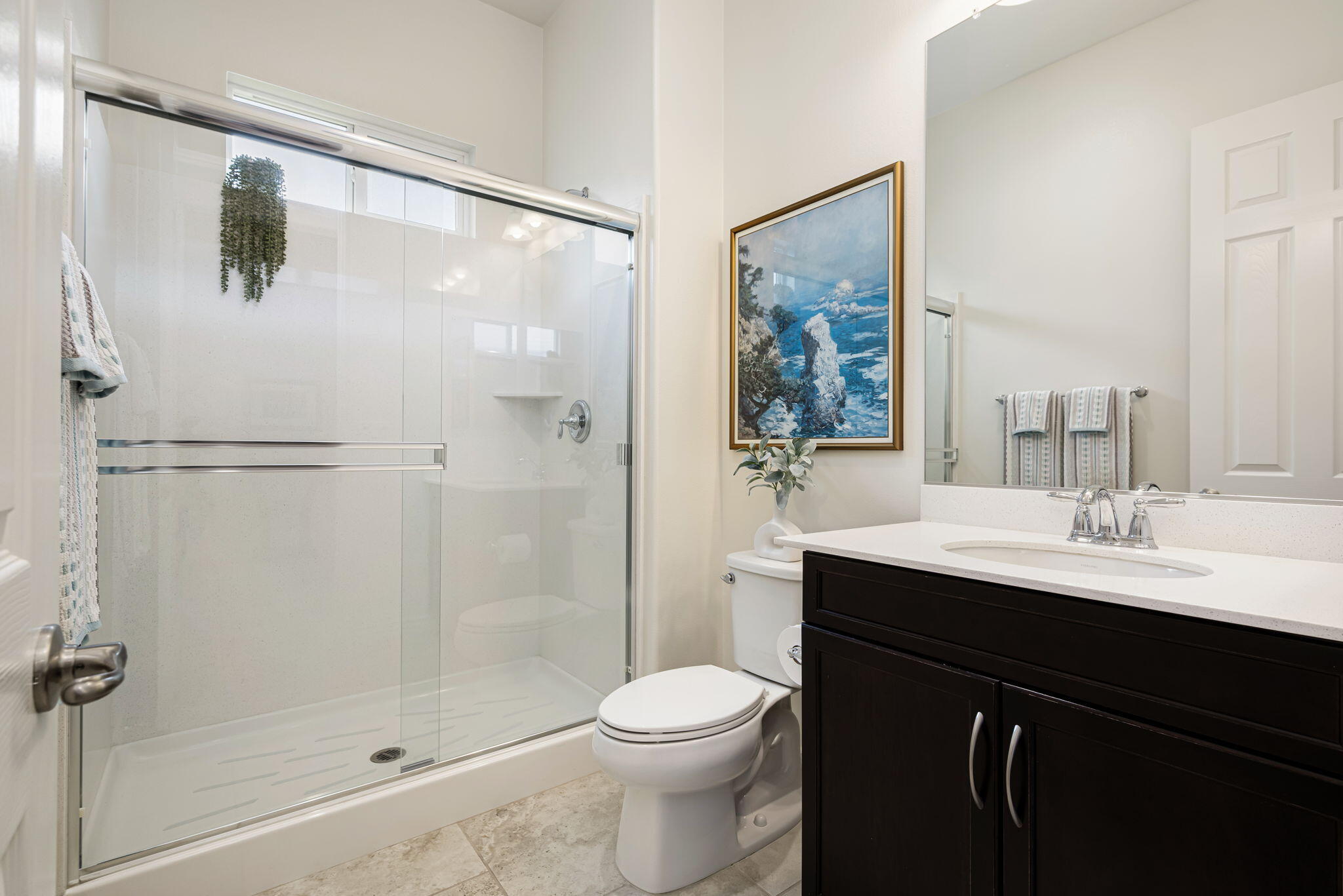 85568 Brovello Drive Indio, CA 92203 - Photo 27 of 50 a bathroom with a sink a toilet and shower