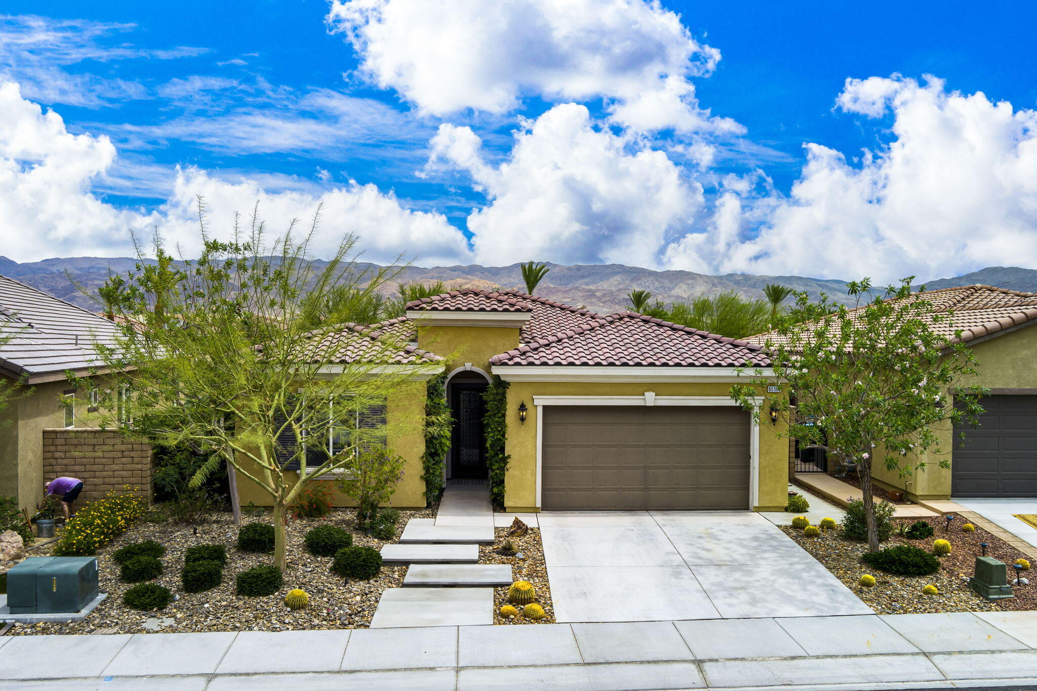 85568 Brovello Drive Indio, CA 92203 - Photo 3 of 50 a front view of a building with garden