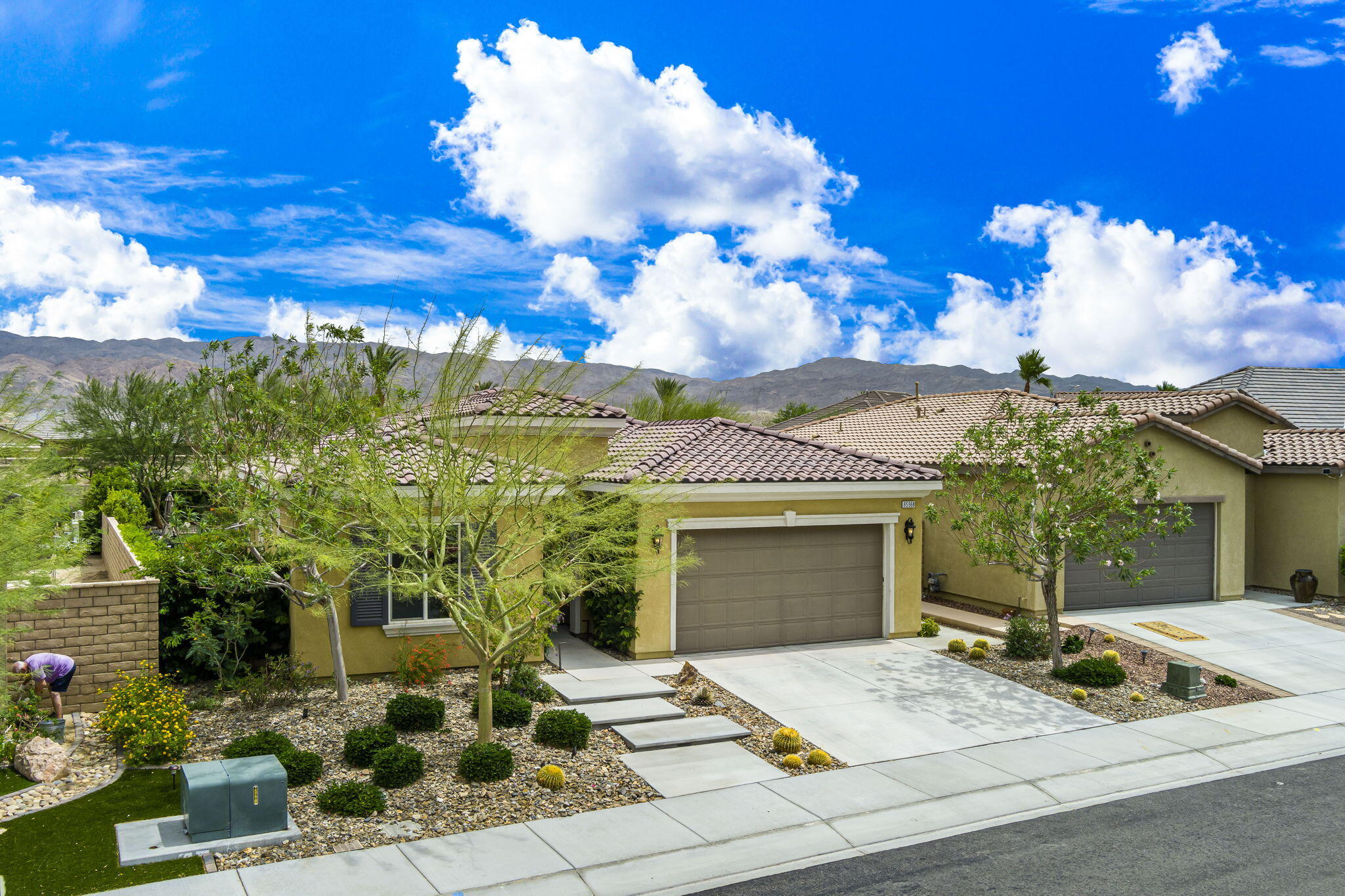 85568 Brovello Drive Indio, CA 92203 - Photo 4 of 50 a front view of a house with garden