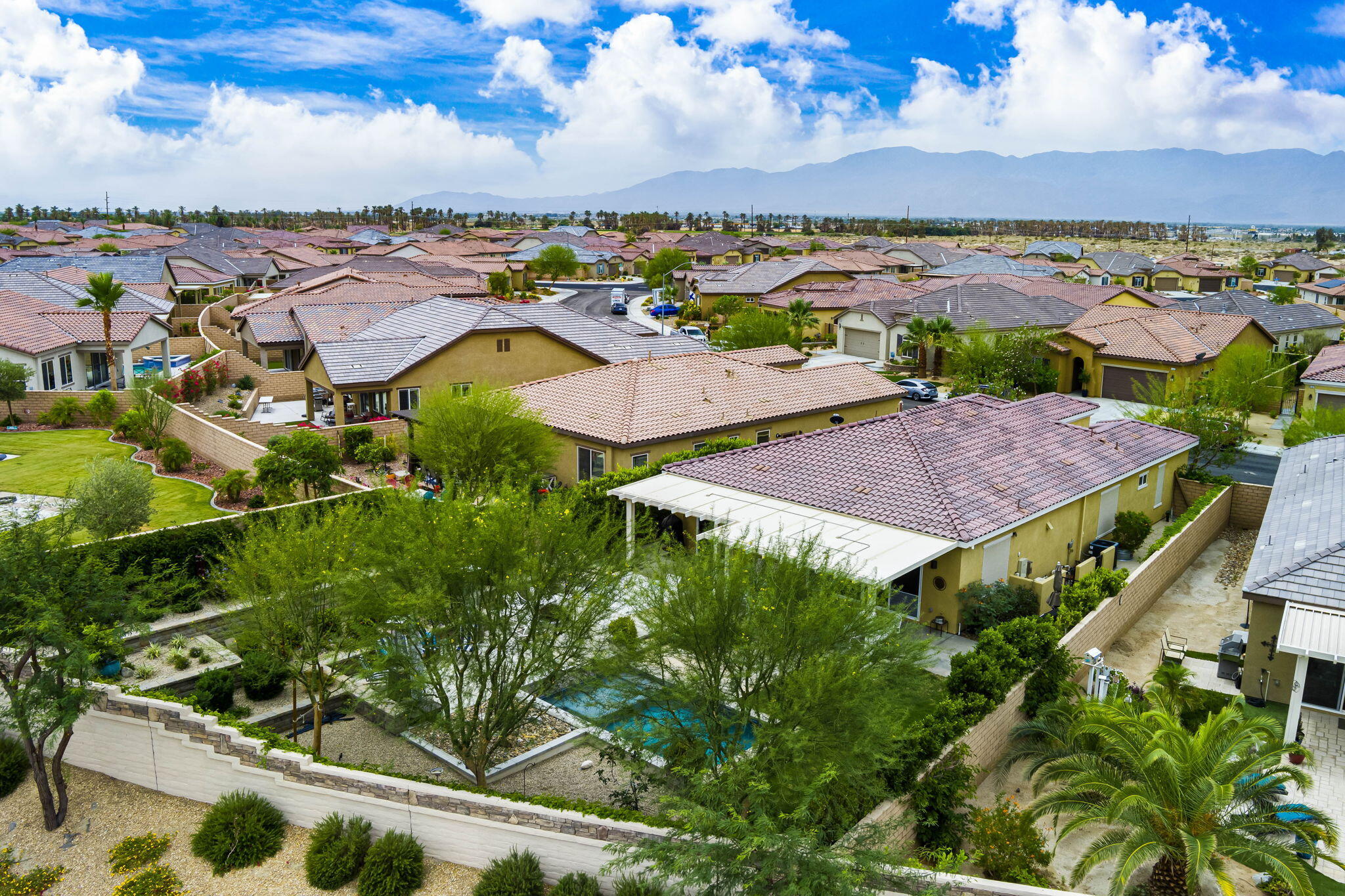 85568 Brovello Drive Indio, CA 92203 - Photo 46 of 50 an aerial view of residential houses with outdoor space and swimming pool