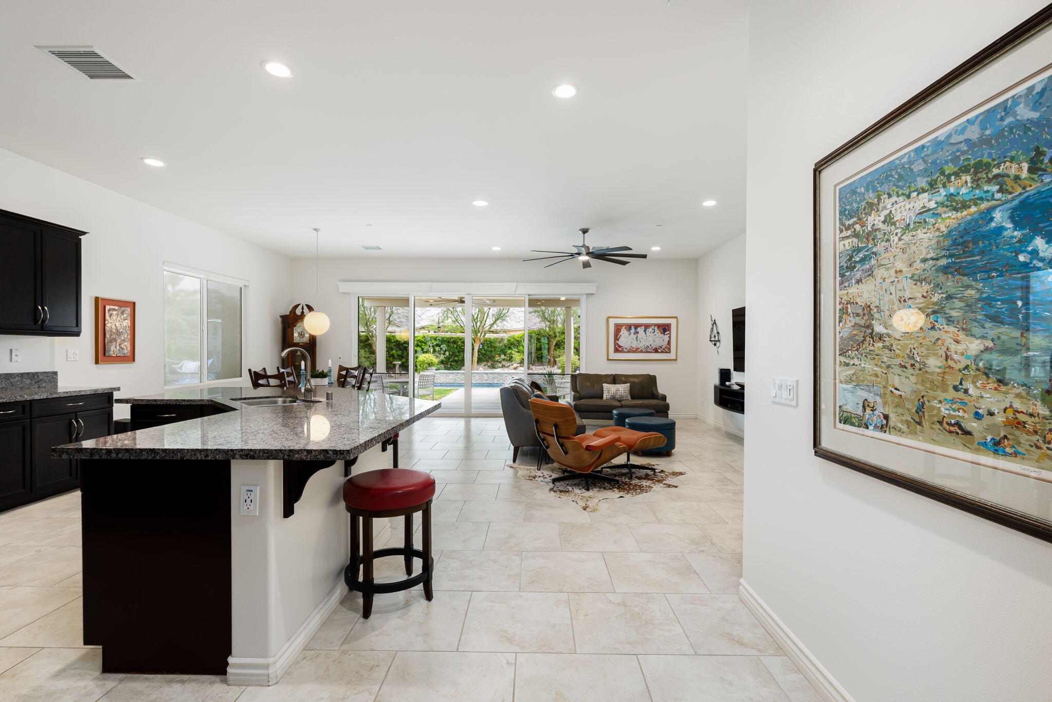 85568 Brovello Drive Indio, CA 92203 - Photo 6 of 50 a living room with furniture a rug and a large window
