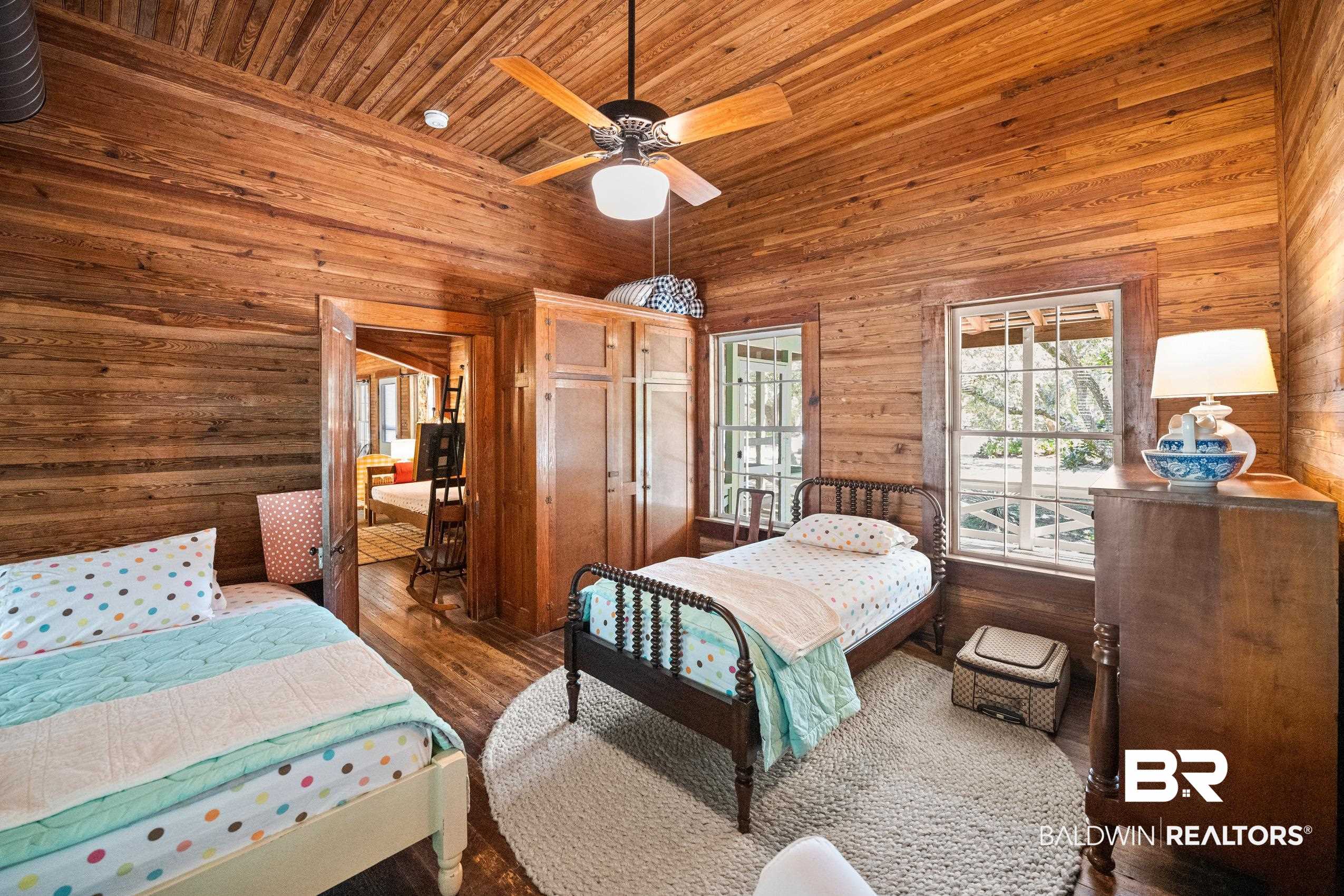 30671 Magnolia Street Elberta, AL 36530 - Photo 35 of 68 Bedroom with wood finished floors, wooden walls, and wooden ceiling