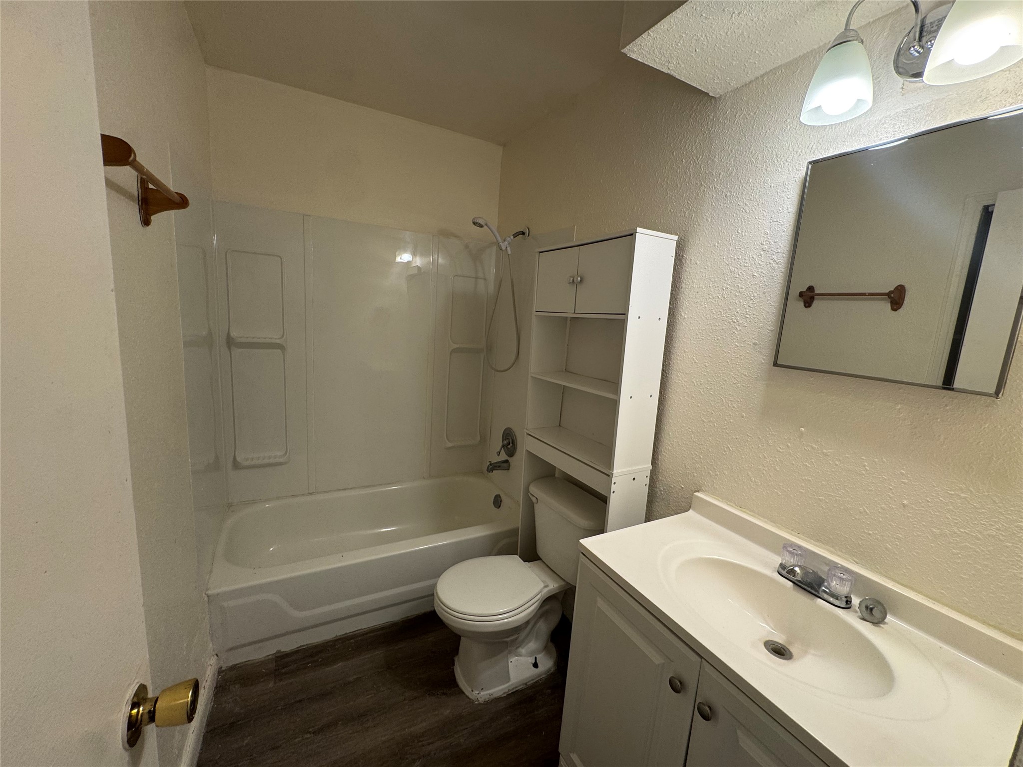 733 Pine Avenue Prairie View, TX 77445 - Photo 12 of 17 a bathroom with a sink toilet and shower