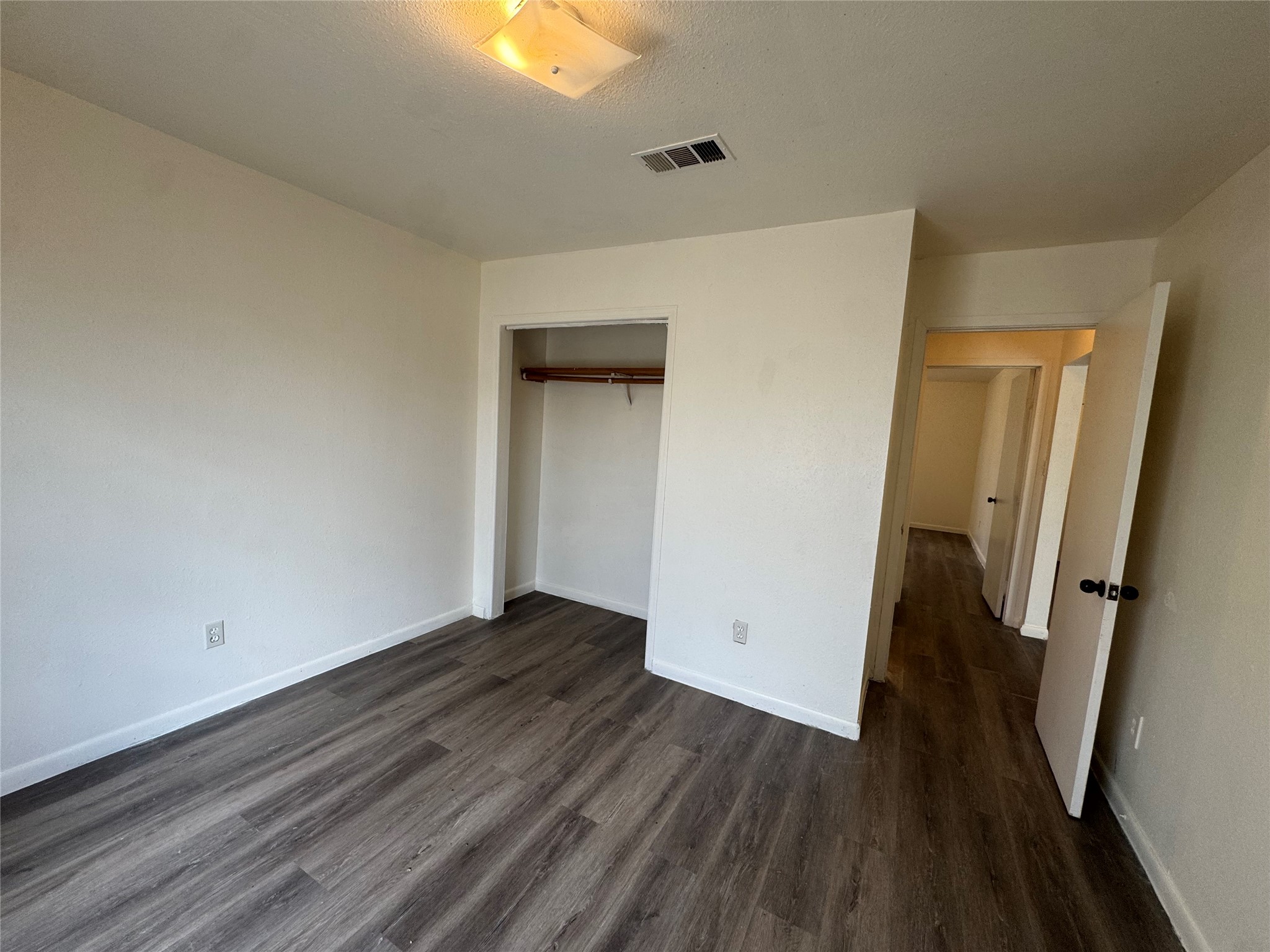 733 Pine Avenue Prairie View, TX 77445 - Photo 10 of 17 wooden floor in an empty room
