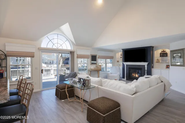 a kitchen with center island table and chairs