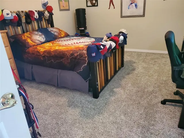 a bedroom with a bed and a closet