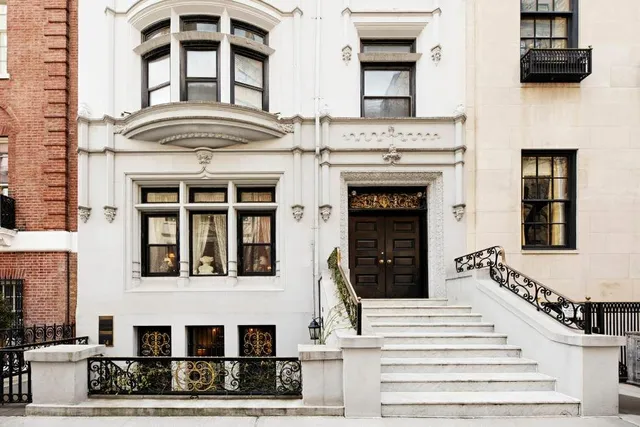 a front view of a building with a street