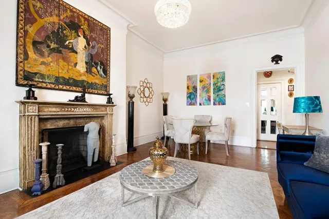a kitchen with stainless steel appliances kitchen island granite countertop a sink and cabinets