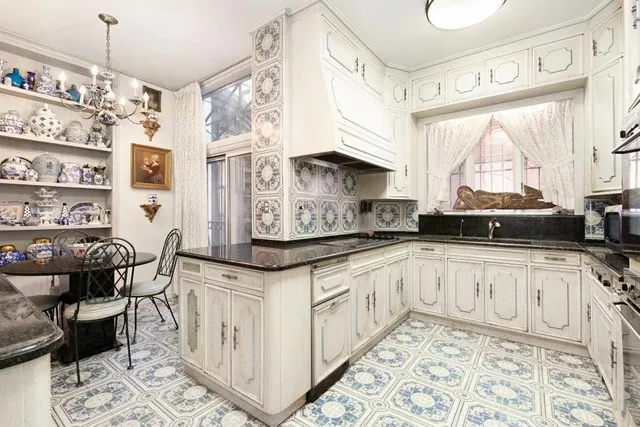 a view of a backyard with sitting area