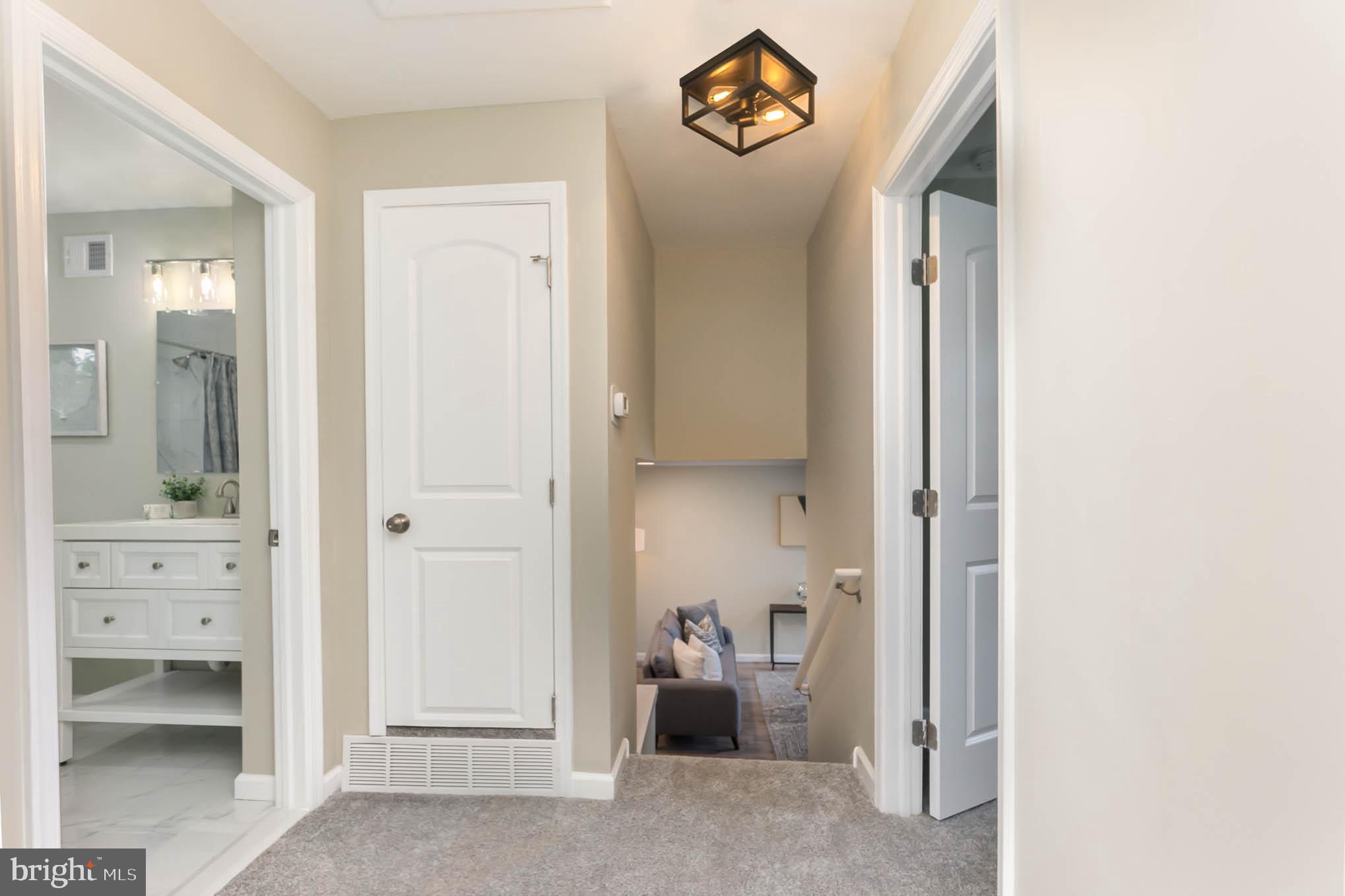9120 Orbitan Road Parkville, MD 21234 - Photo 13 of 30 Hallway, linen closet, bathroom entrance