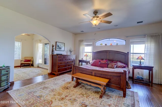 a view of a backyard with sitting area