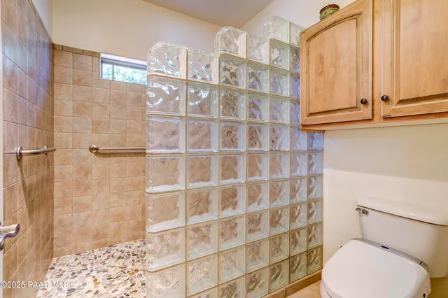 a bathroom with a sink a vanity and a mirror