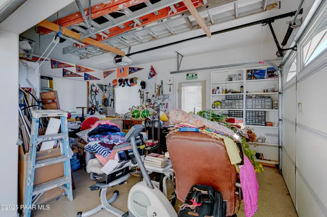 a view of a patio with a dining table and chairs