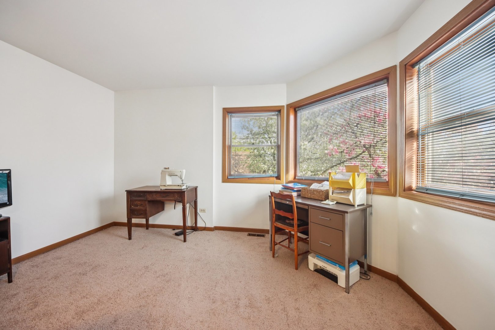37 Terrace Lane, Unit F Lake Zurich, IL 60047 - Photo 20 of 40 a view of a workspace with furniture and a window