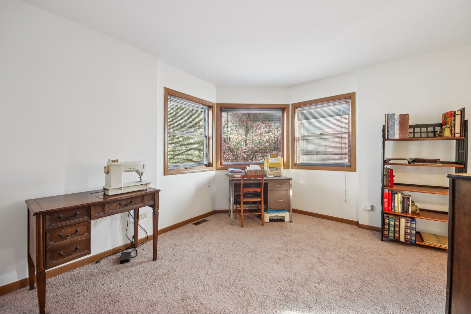 37 Terrace Lane, Unit F Lake Zurich, IL 60047 - Photo 22 of 40 a view of a workspace with furniture and a window