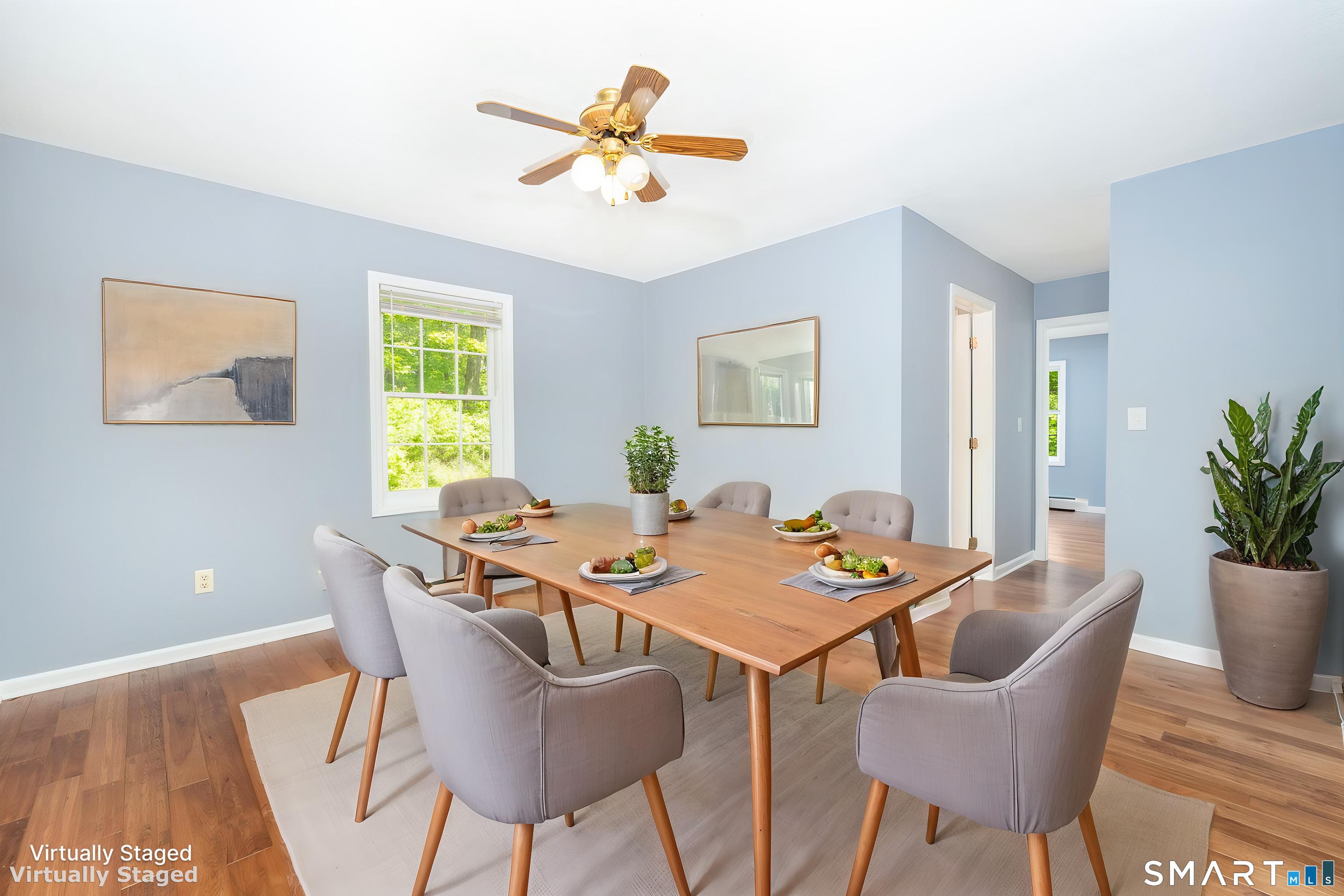 175 Vernon Street Manchester, CT 06042 - Photo 10 of 38 a view of a dining room with furniture and a potted plant