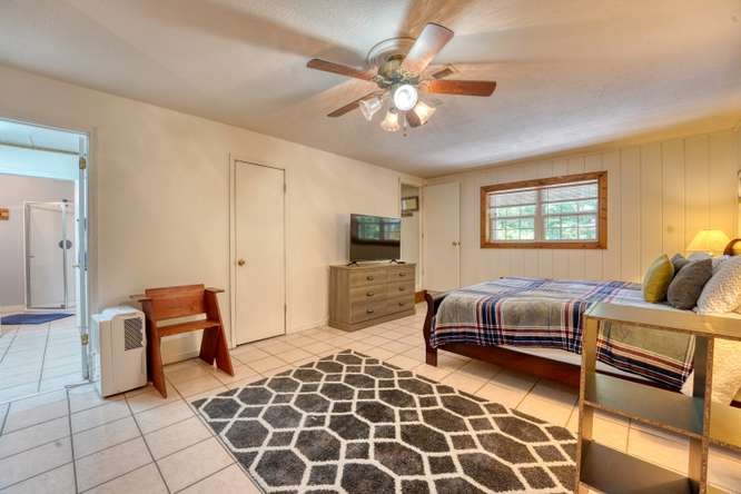 3333 Ellington Road Hayesville, NC 28904 - Photo 55 of 56 a bedroom with furniture and a window