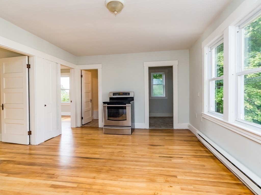 133 Baker Street Gardner, MA 01440 - Photo 4 of 10 a view of a livingroom with wooden floor