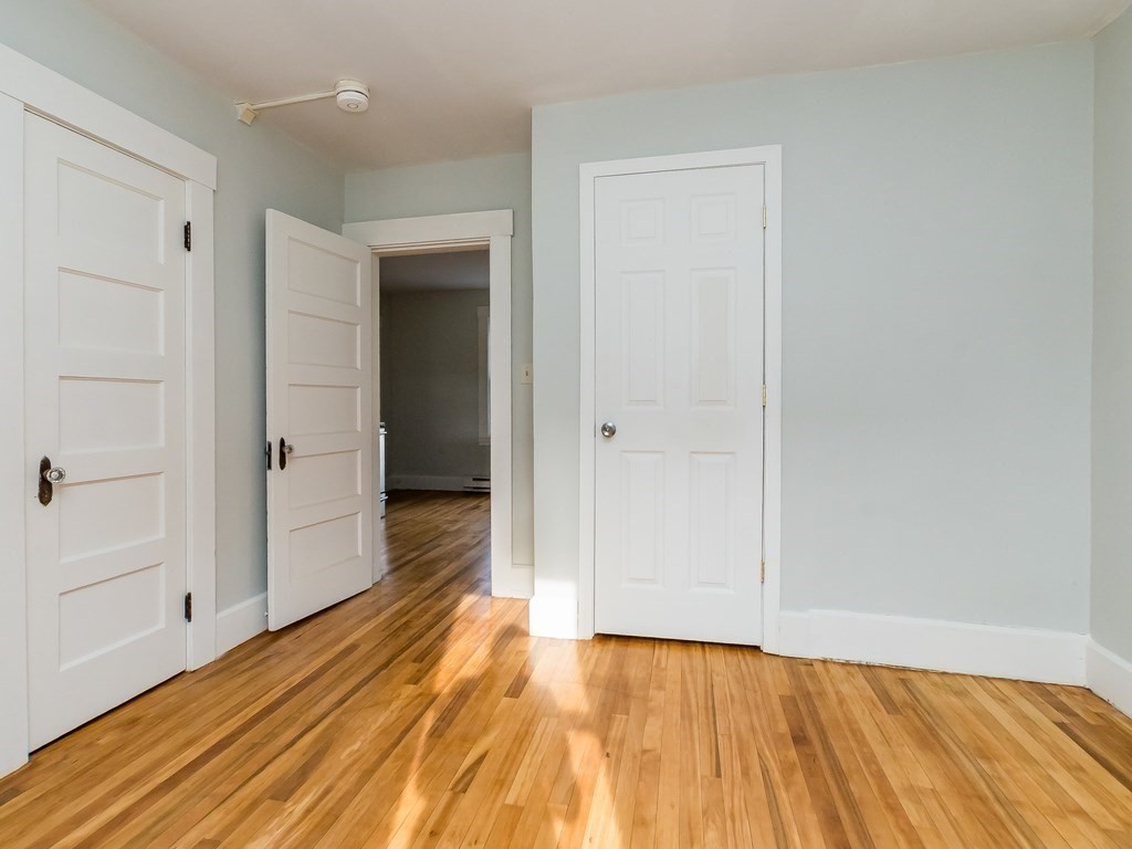 133 Baker Street Gardner, MA 01440 - Photo 5 of 10 a view of a room with wooden floor and closet