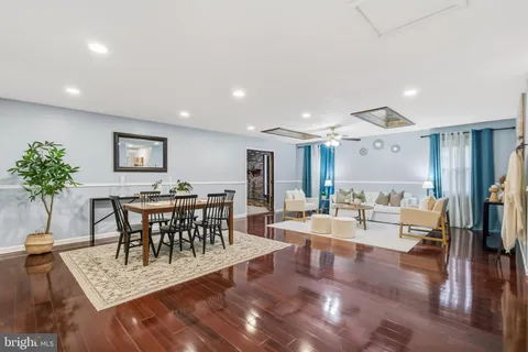 a living room with furniture and a table