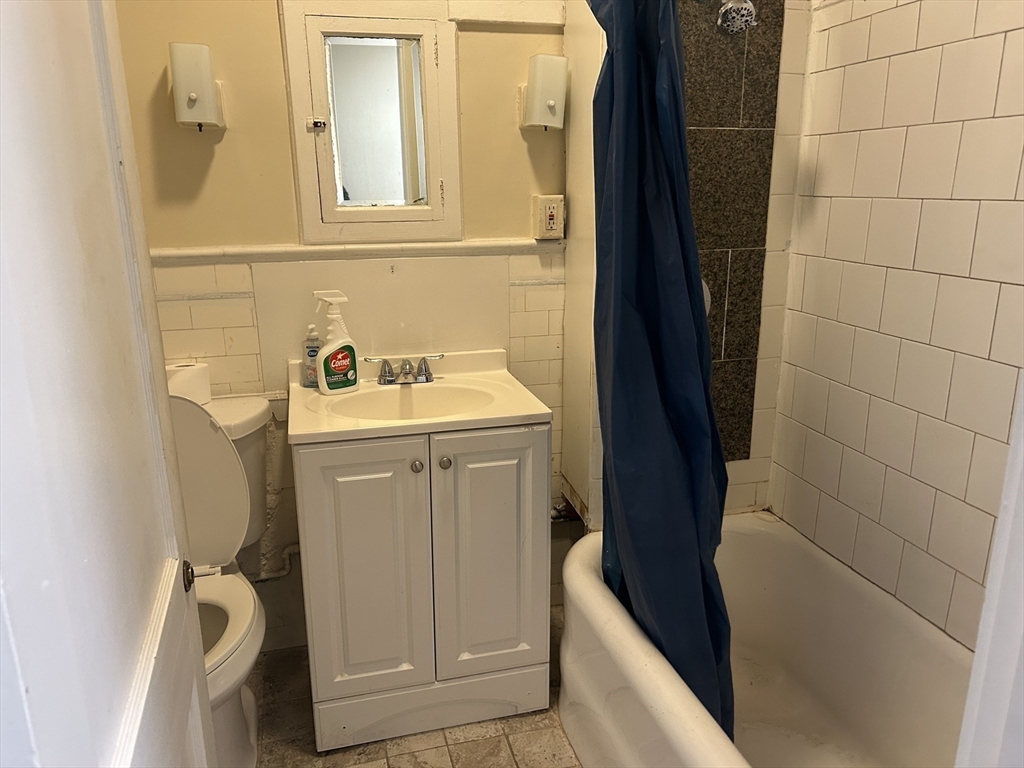 1719 Northampton Street, Unit 3 Holyoke, MA 01040 - Photo 6 of 11 a utility room with dryer and washer