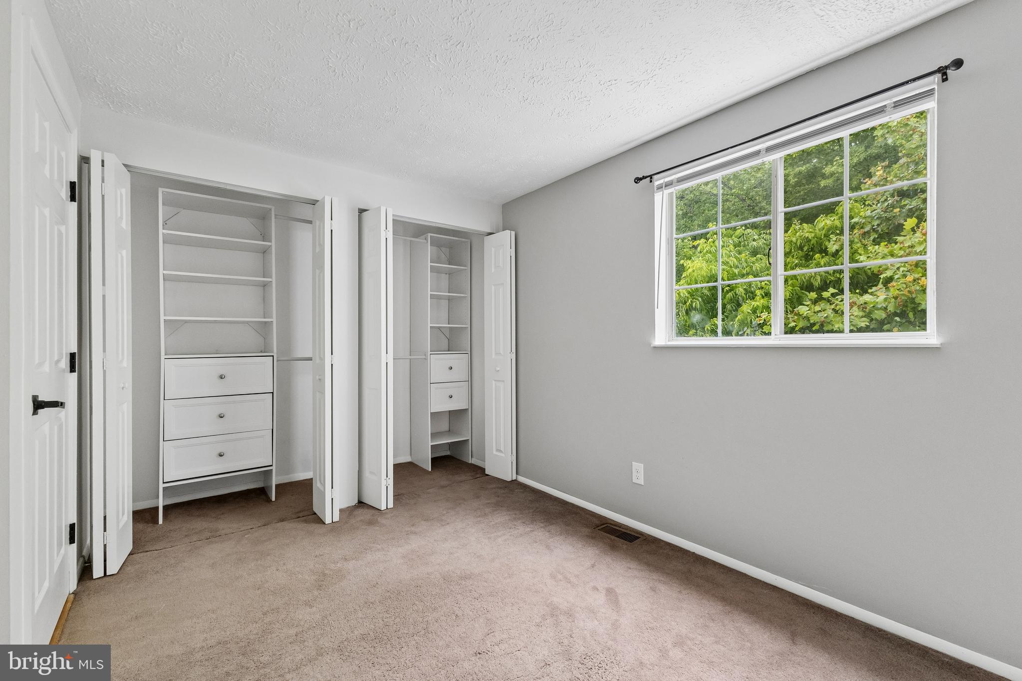8317 Brookvale Court Springfield, VA 22153 - Photo 24 of 33 an empty room with closet area