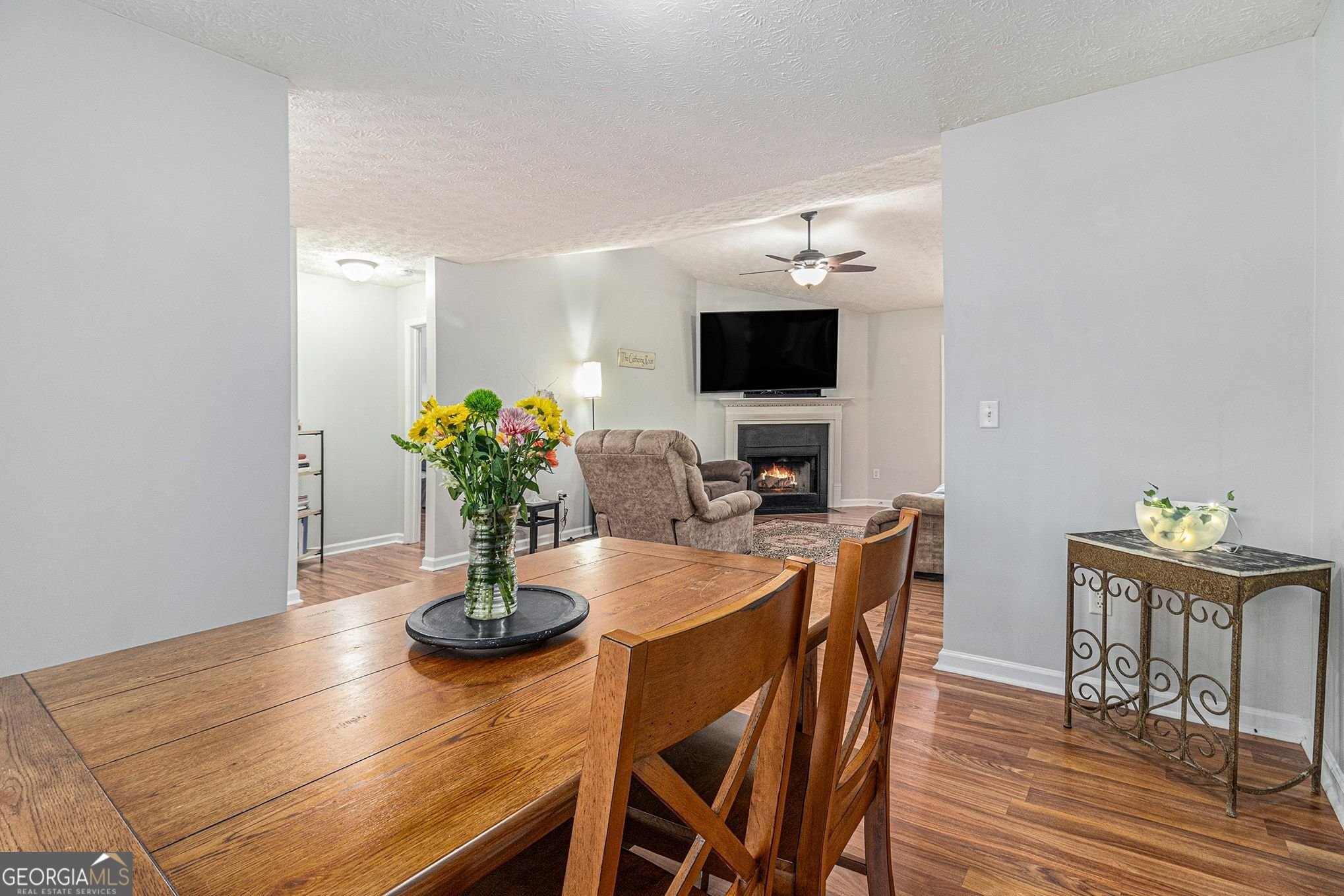30 Old Mill Way Senoia, GA 30276 - Photo 12 of 29 a dining room with furniture and wooden floor