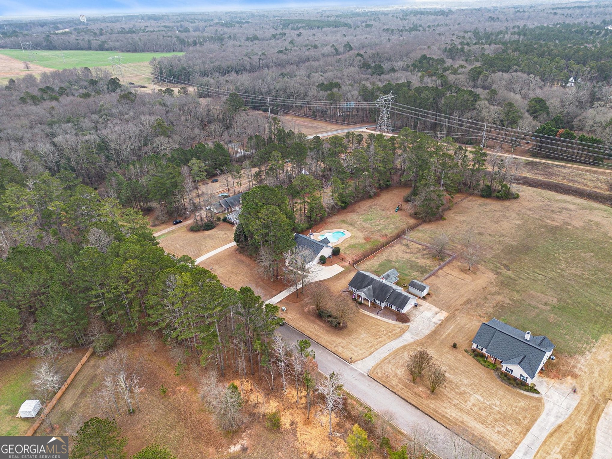 30 Old Mill Way Senoia, GA 30276 - Photo 25 of 29 an aerial view of a house with a yard