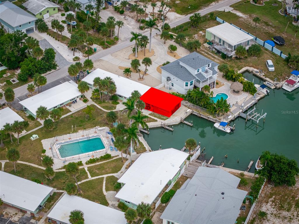 1385 Gulf Boulevard, Unit 10 Englewood, FL 34223 - Photo 14 of 36 an aerial view of a house with a swimming pool and outdoor space