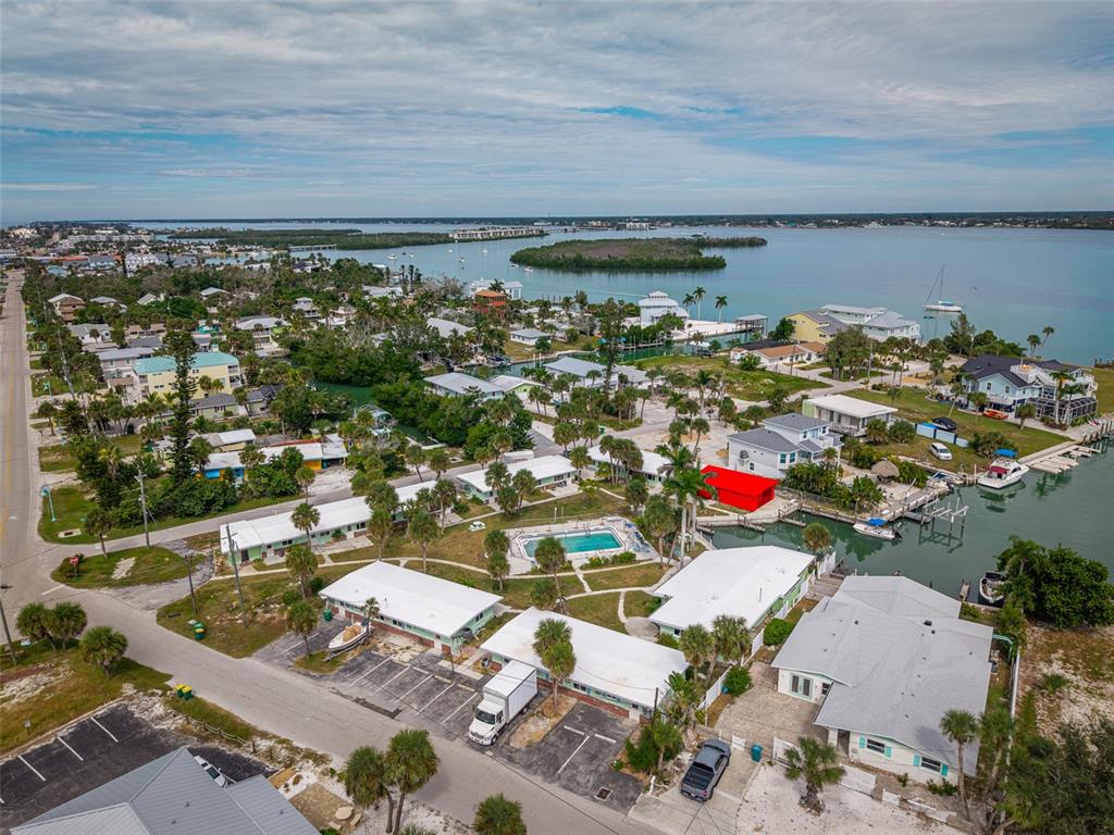 1385 Gulf Boulevard, Unit 10 Englewood, FL 34223 - Photo 19 of 36 an aerial view of a house with a lake view
