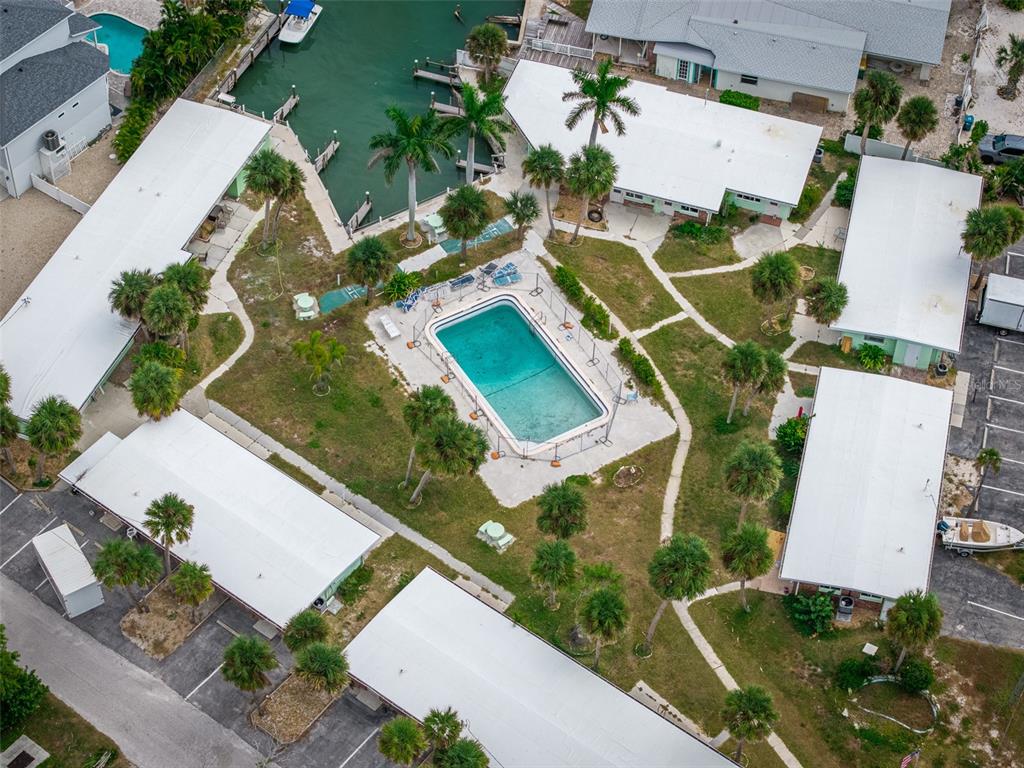 1385 Gulf Boulevard, Unit 10 Englewood, FL 34223 - Photo 23 of 36 an aerial view of a house