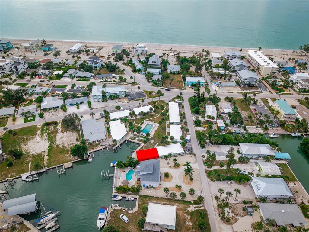 1385 Gulf Boulevard, Unit 10 Englewood, FL 34223 - Photo 30 of 36 an aerial view of residential houses with outdoor space