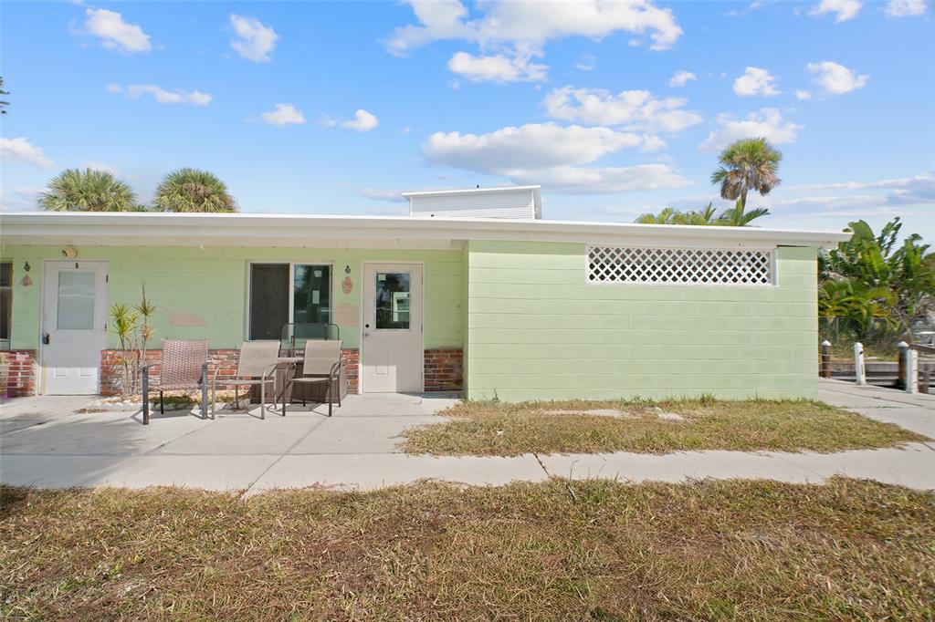 1385 Gulf Boulevard, Unit 10 Englewood, FL 34223 - Photo 3 of 36 a view of a terrace with seating space