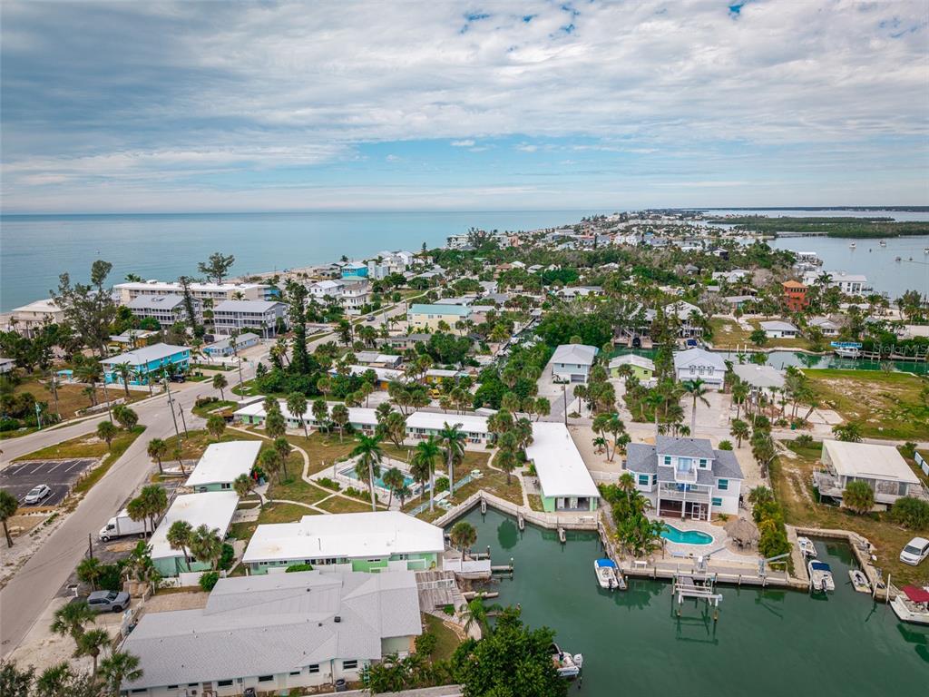 1385 Gulf Boulevard, Unit 10 Englewood, FL 34223 - Photo 32 of 36 an aerial view of residential building with outdoor space