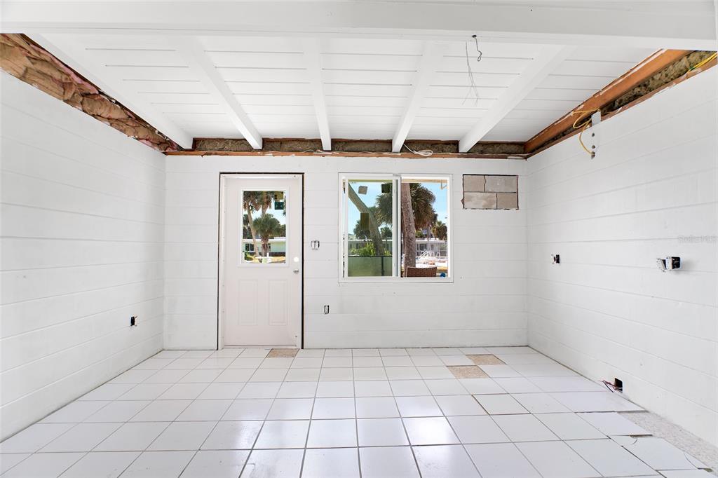 1385 Gulf Boulevard, Unit 10 Englewood, FL 34223 - Photo 7 of 36 a view of an empty room