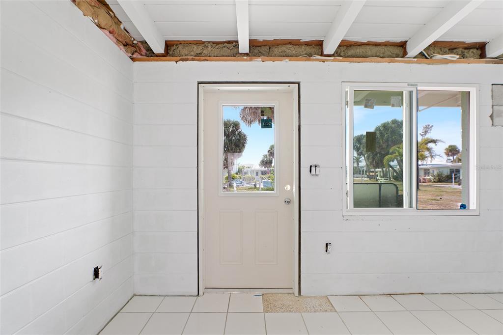 1385 Gulf Boulevard, Unit 10 Englewood, FL 34223 - Photo 9 of 36 front view of a house with a window