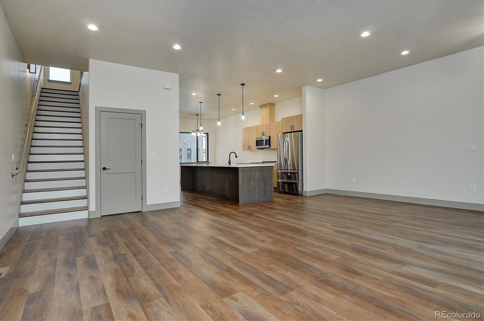 6398 Cleora Road, Unit G Salida, CO 81201 - Photo 11 of 34 a view of a kitchen with wooden floor and a kitchen