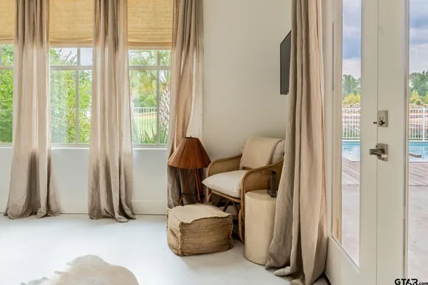 a view of a lake with a houses in the back