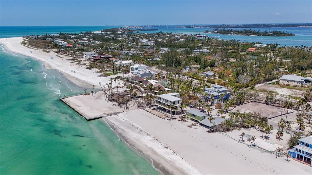 6603 Gulfside Road Longboat Key, FL 34228 - Photo 19 of 40 an aerial view of residential houses with outdoor space